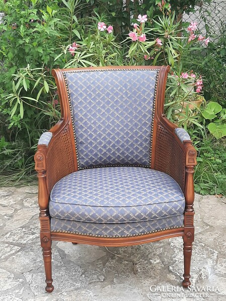 xvi. A rare double reeded elegant armchair in Louis style