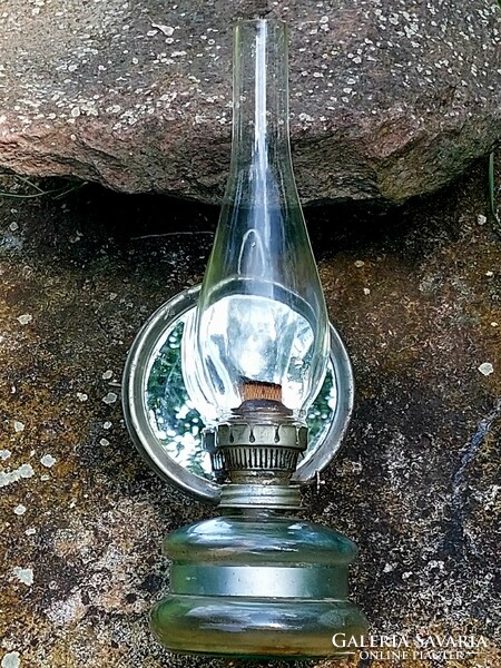 Kerosene lamp with mirror.