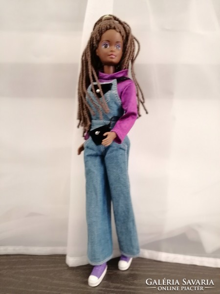 A barbie, a hasbro doll