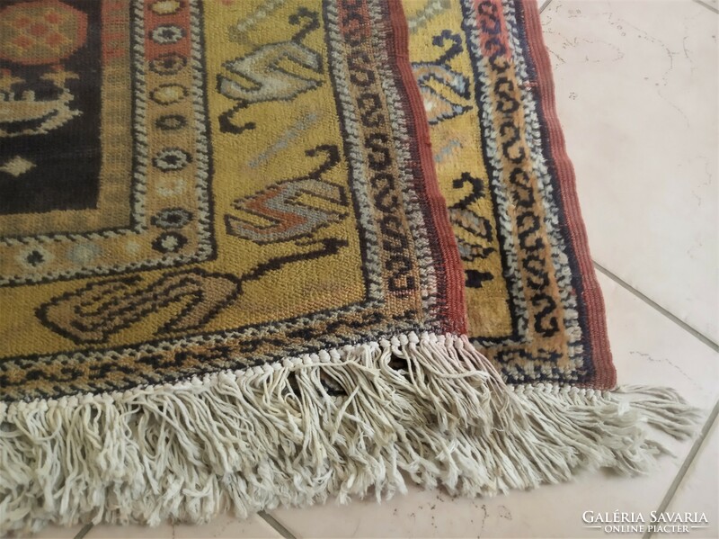 Antique Caucasian nomadic carpet with animal motif - 120x226 cm