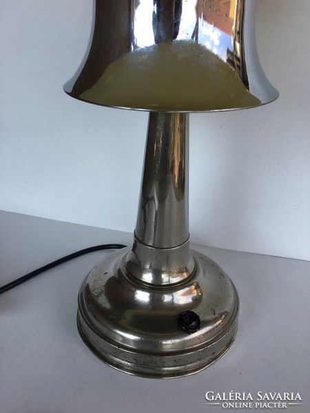 Art deco lamp with a butter colored looped cover