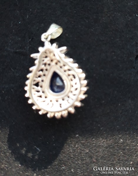 Drop-shaped silver pendant with sapphire and topaz stones