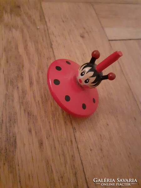 Red black wood spinner ladybug pattern is almost miraculous