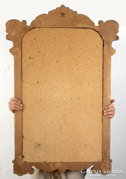 Carved wooden framed mirror with column decoration