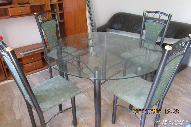 Iron dining table with glass top