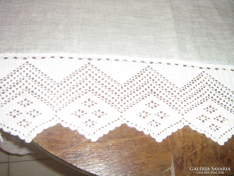 Beautiful vintage crocheted white curtain with lace bottom