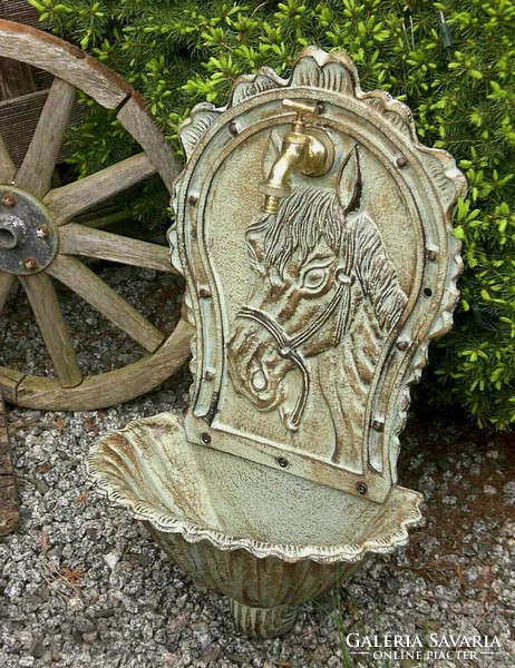 Cast iron equestrian wall well
