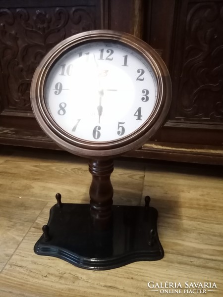 A special tilted table clock. 54 X 34 cm.