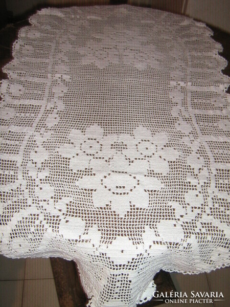 Beautiful antique white hand crocheted floral wavy edge oval tablecloth
