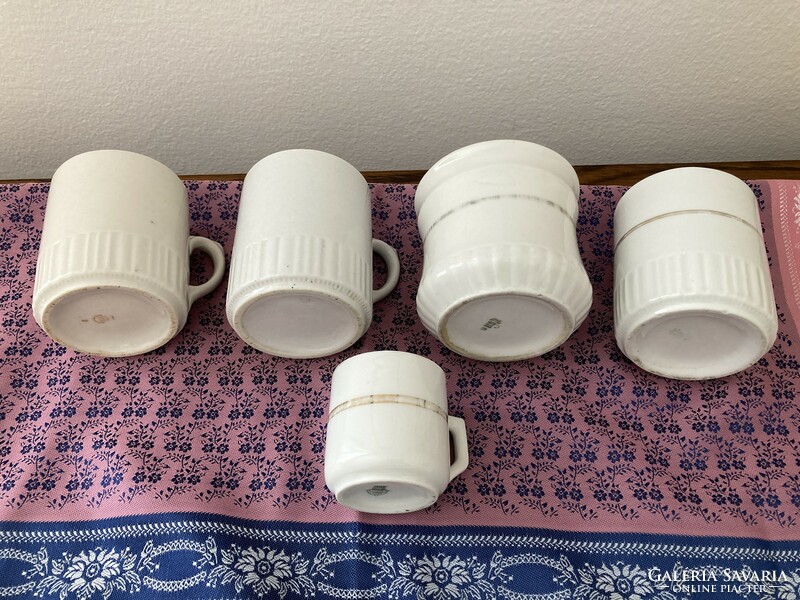 A selection of old Zsolnay white mugs