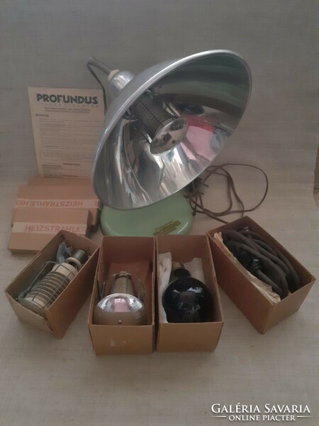 Vintage heating radiant lamp suitable for other healing treatments in its own box with description