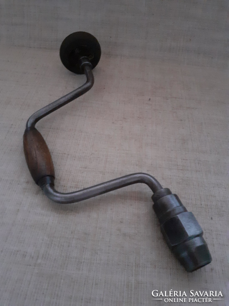 Old wrought iron hand drill with master mark