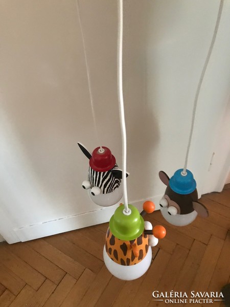 A very beautiful, funny figure children's room ceiling lamp. In new condition.