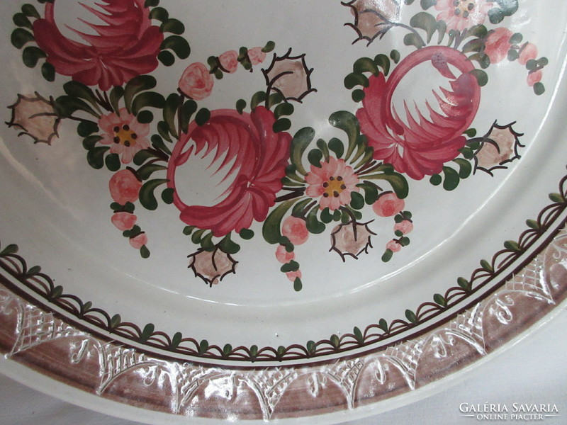 Old, marked, hand-painted German wall plate. Negotiable!