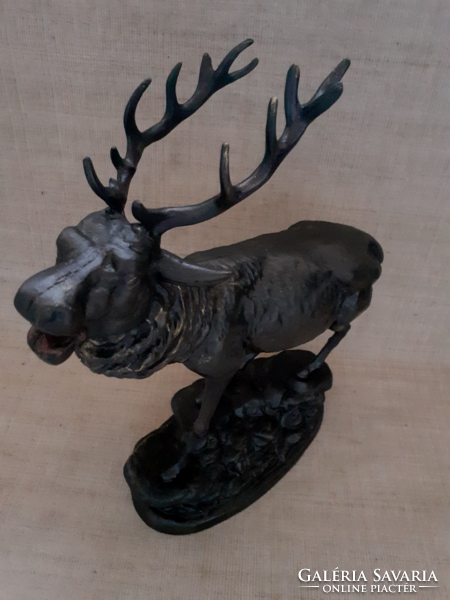 Old cast iron deer statue