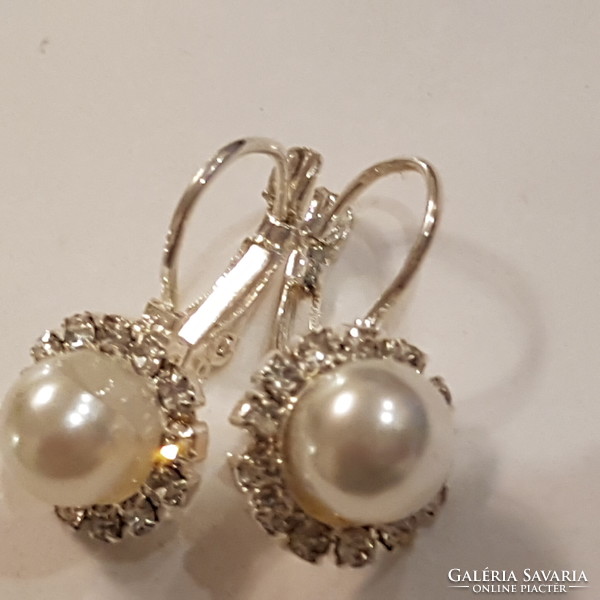 Earrings with zircon stones..