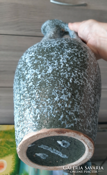 A large retro ceramic vase with a wonderful shape is probably from a plague cold well