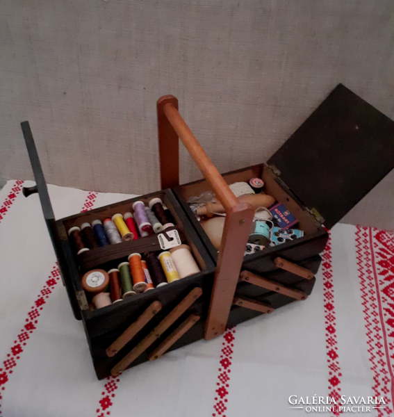 Openable multi-level sewing box with accessories in old preserved condition