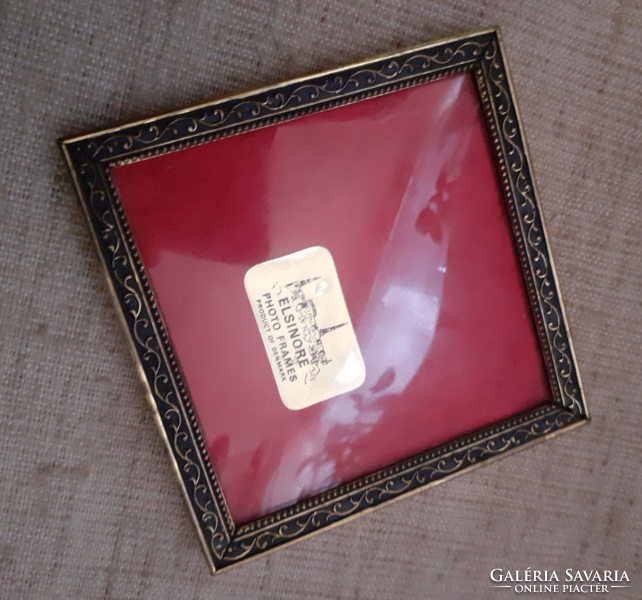 Old brass rectangular small picture frame with convex glass inside
