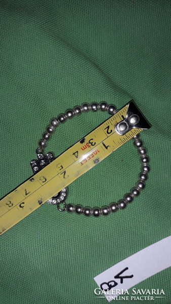 Fashionable metal bracelet decorated with pearl-colored rhinestones, according to the pictures k 8.