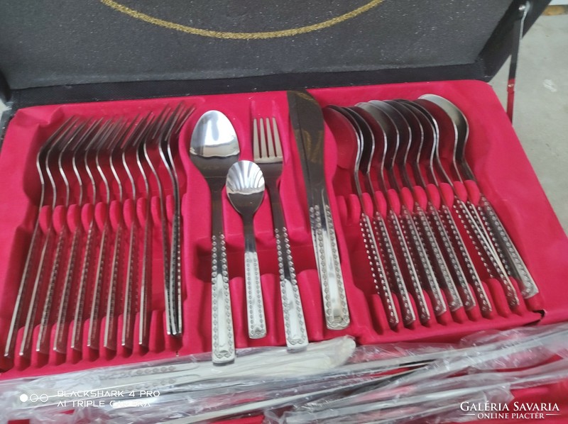 New set of cutlery, in a suitcase with a number lock