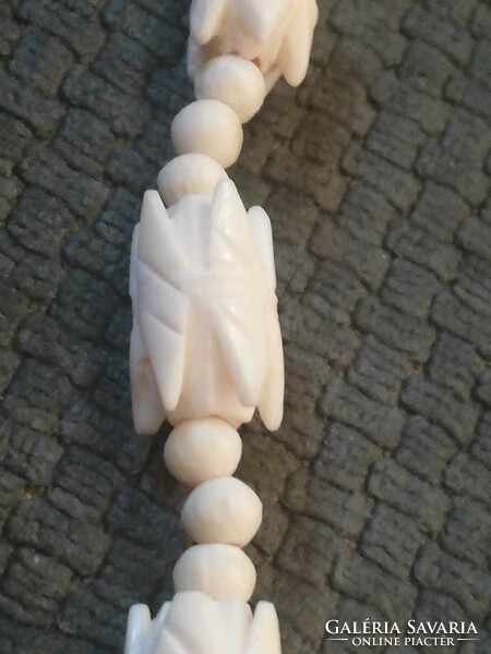 Beautiful old carved bone necklace with large elephant pendant