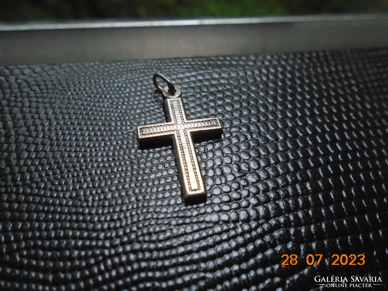 Antique silver cross pendant with fine chiseled pattern