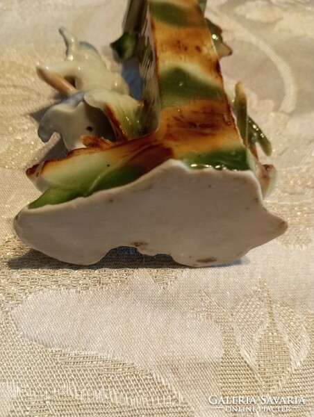 Porcelain figural mini vase