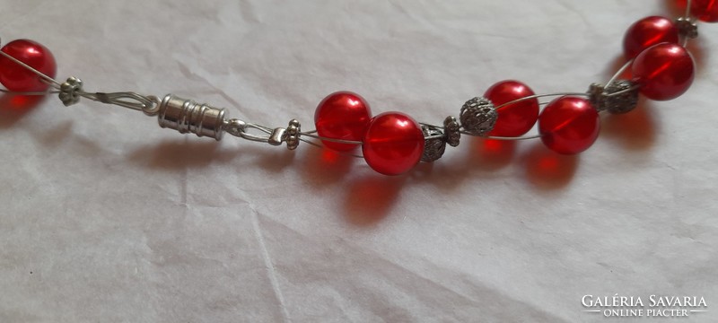 Necklace with red plastic beads and metal beads