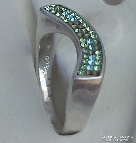 Women's silver ring with silver and green stones