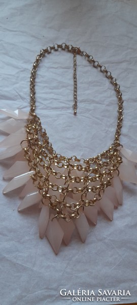 Very showy necklace with pink decorations and spikes