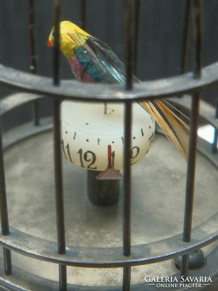 Bird cage clock.