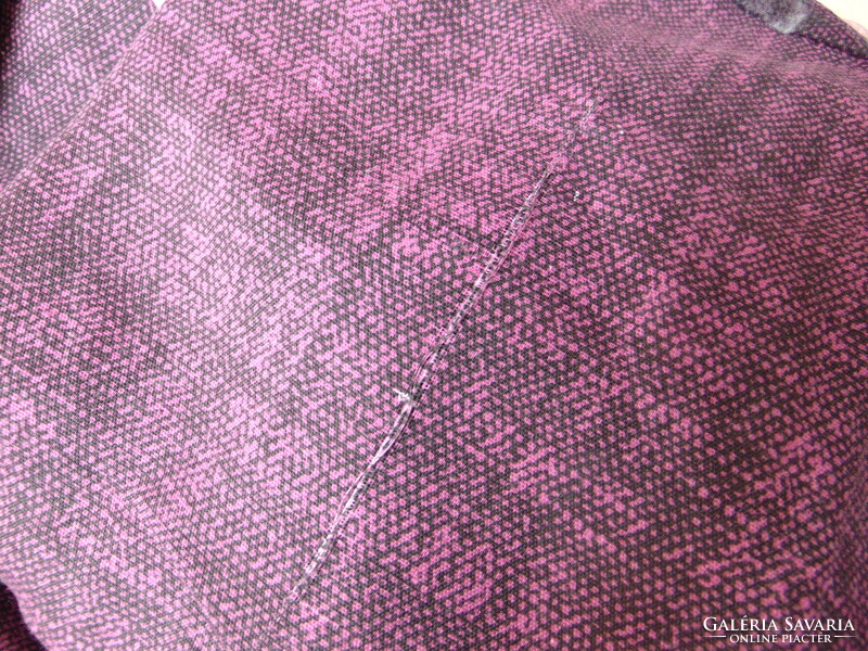 A dreamy pink bedding set on a purple background