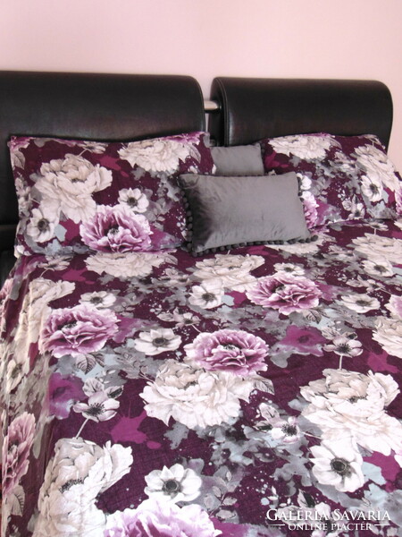 A dreamy pink bedding set on a purple background