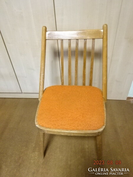 Retro kitchen chair, wooden frame, with orange canvas seat. Delivery 55 ft/km Jokai.