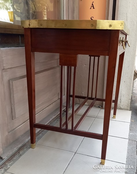 Table with drawers with copper decoration