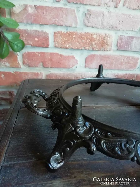 Utensil holder for a gas stove from the beginning of the 20th century, nice cast iron decoration, possibly a utensil coaster