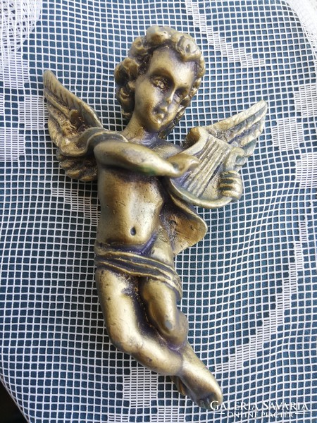 Antique angel with harp