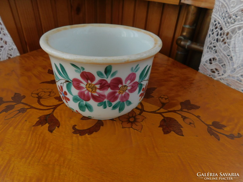 Old coma cup with floral pattern