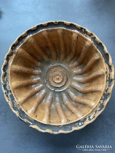 A very old folk potter's ceramic kuglóf oven, ideal for ovens