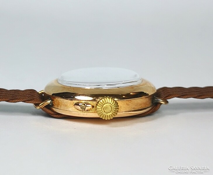 14 K gold case women's watch from the 1920s! With Tiktakwatch service card, warranty!