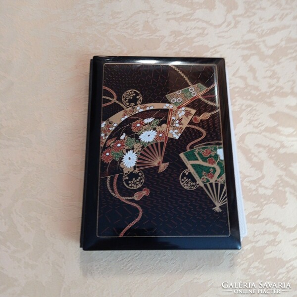 Old photo album with oriental design 18 x 12.5 cm