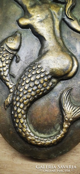 Bronze mermaid wall decoration..... This is really bronze