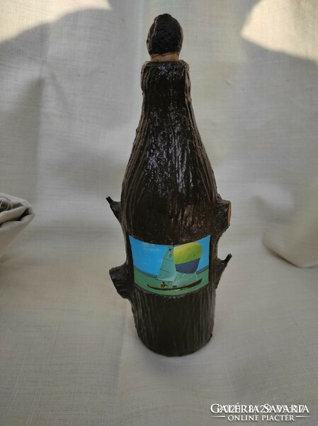 Retro beer bottle with wood imitation