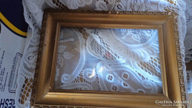 Picture frame glazed with gold color with minor defects