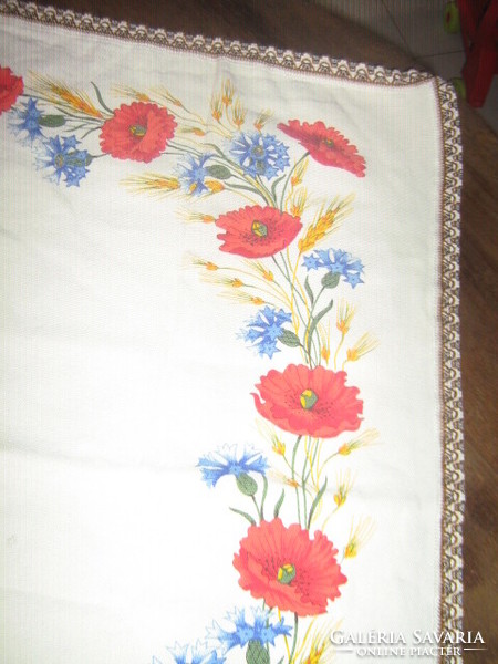 Charming vintage-style tablecloth with summer flowers and poppies