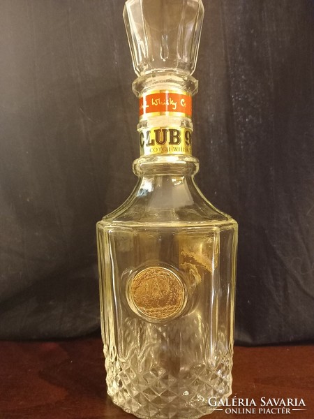 Club 99 whiskey bottle.