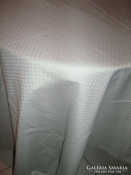 Beautiful light damask tablecloth with pale gray pattern