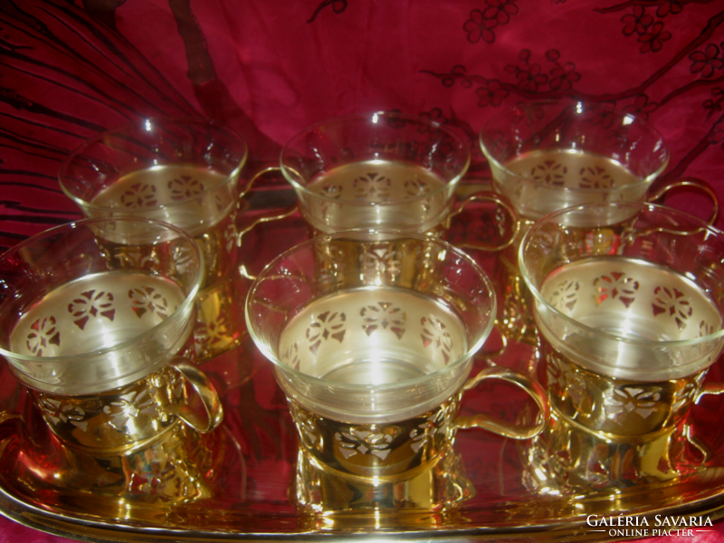 In a silver-plated holder, schott & gen mainz jena glass set with tray