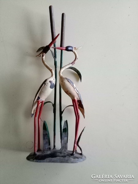 Retro crane bird composition made of metal